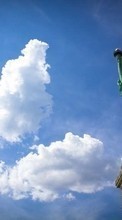 Descargar la imagen Paisaje,Nubes,Estatua de la Libertad para celular gratis.