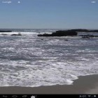 Además de los fondos de pantalla animados para Android Cruz 3D, descarga la apk gratis de los salvapantallas Playa real.
