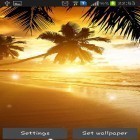 Además de los fondos de pantalla animados para Android Atardecer de invierno, descarga la apk gratis de los salvapantallas Puesta de sol en la playa.