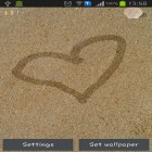 Además de los fondos de pantalla animados para Android Esto es amor , descarga la apk gratis de los salvapantallas Dibuja en la arena .